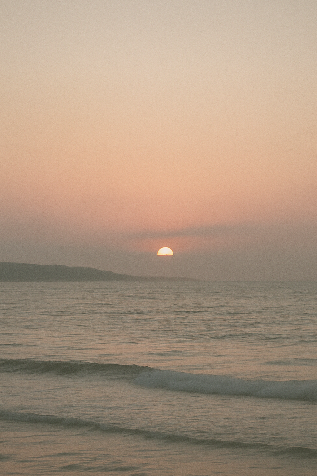 Soft sunrise over a calm sea